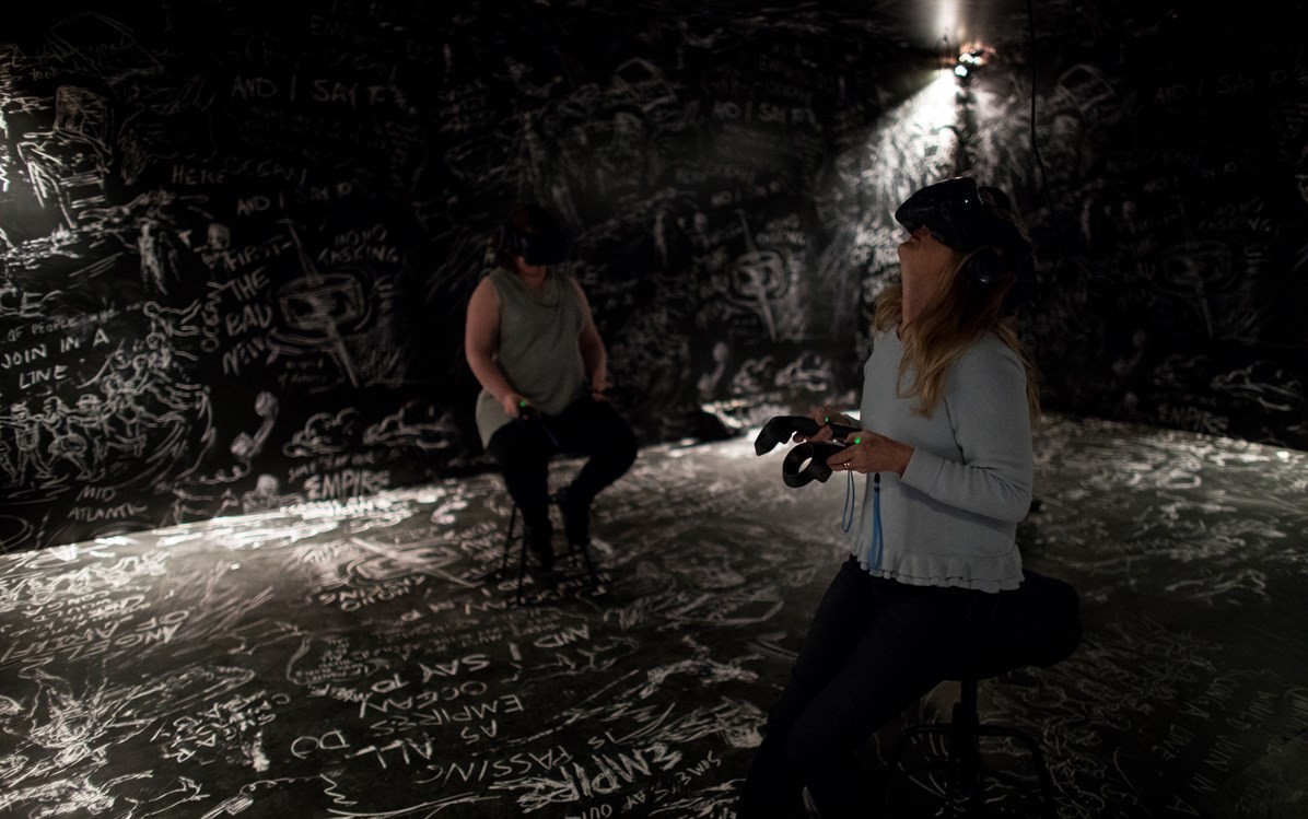 Image of Laurie Anderson and Hsin Chien Huang. Chalkroom, 2017, Flourescent Paint On Slate Walls. Courtesy The Artists 