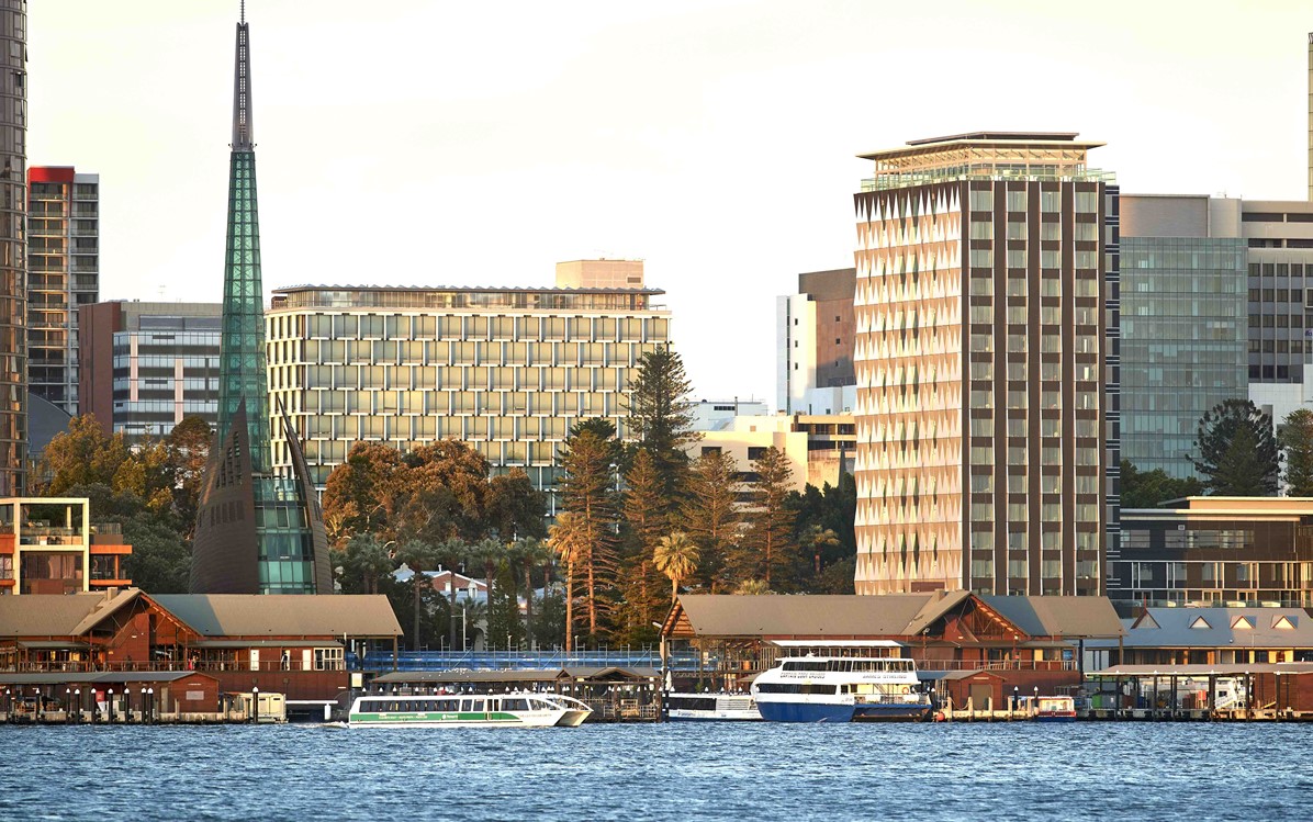 A photo taken from the river of DoubleTree Waterfront hotel, Council House and the Bell Tower are also pictured.