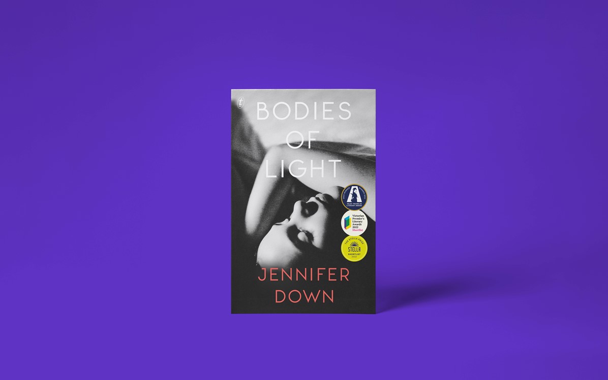 A book cover with the title 'Bodies of Light' by Jennifer Down with a purple background