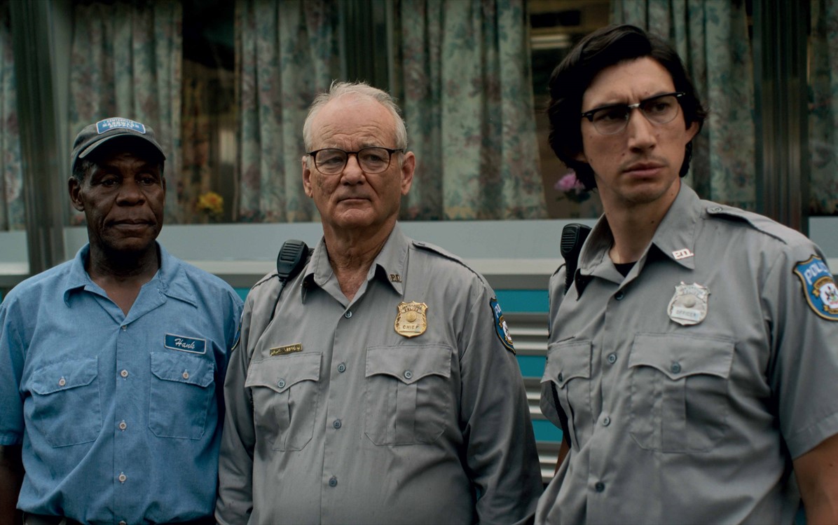 Image of 2 police officers and an indigenous man in ''The Dead Don't Die''