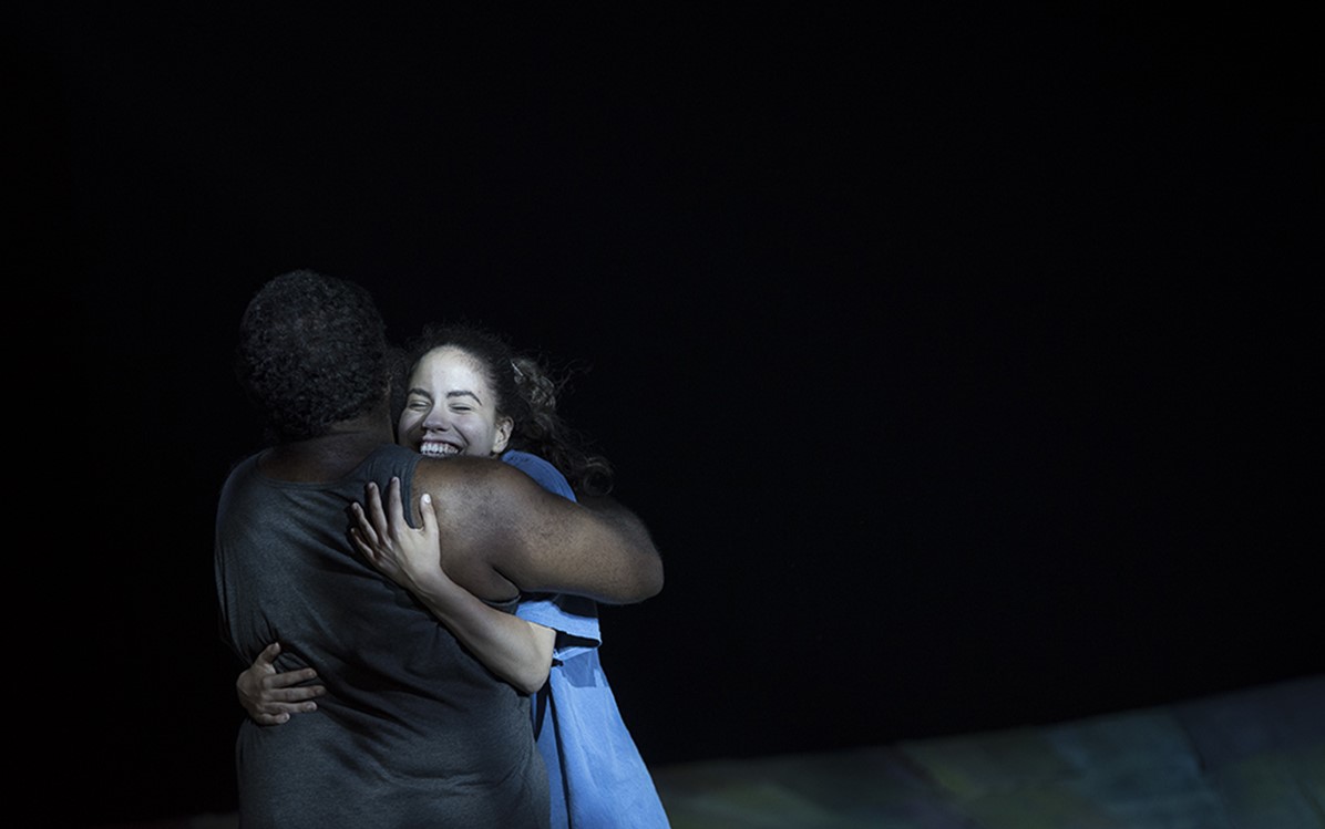 Image of two people hugging in the Hecate production 
